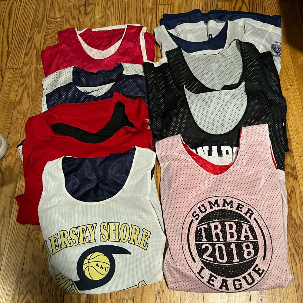 Lot of 8 basketball jerseys from numerous camps and travel teams